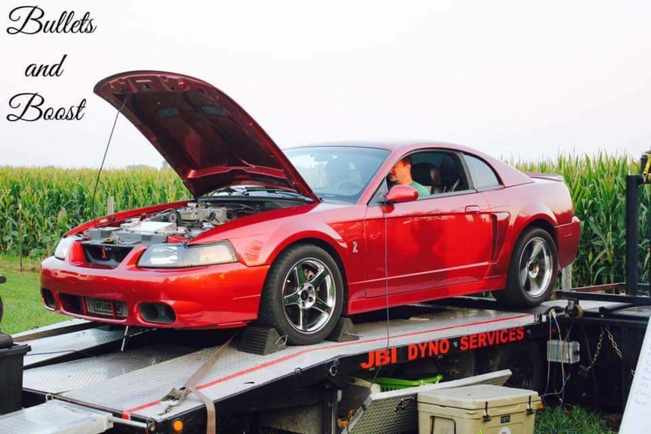 2004 Ford Mustang SVT Cobra SVT | Sioux Falls, SD, Redfire Clearcoat Metallic (Red & Orange), Rear Wheel