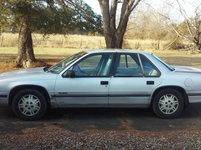 1992 Chevrolet Lumina Euro, Silver Metallic (Silver), Front Wheel