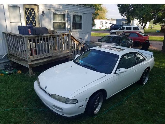 1995 Nissan 240SX Base, Aspen White Pearlglow (White), Rear Wheel