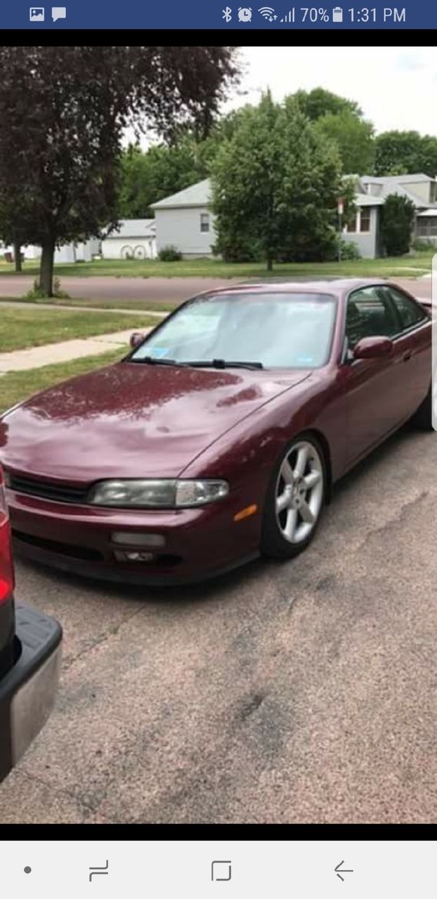 1995 Nissan 240SX SE | Watertown, SD, Ruby Pearl (Red & Orange), Rear Wheel