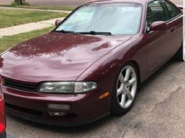 1995 Nissan 240SX SE, Ruby Pearl (Red & Orange), Rear Wheel