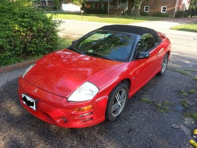 2004 Mitsubishi Eclipse GS, Ultra Red Pearl (Red & Orange), Front Wheel
