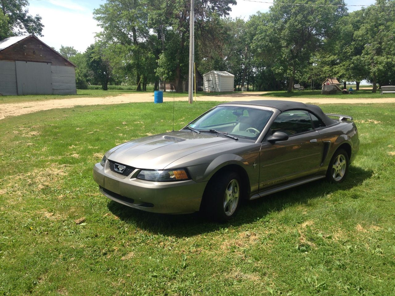 2002 Ford Mustang | Parker, SD, Mineral Gray Clearcoat Metallic (Gray), Rear Wheel