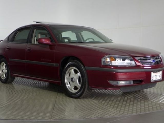 2002 Chevrolet Impala LS, Dark Carmine Red Metallic (Red & Orange), Front Wheel