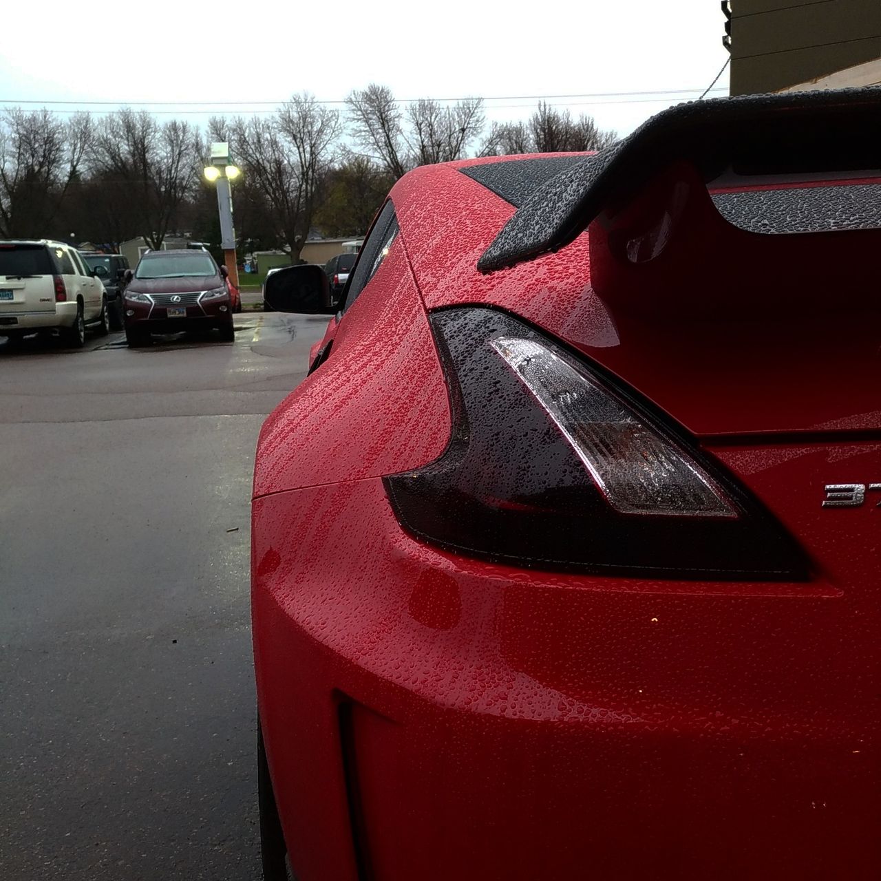 2014 Nissan 370Z NISMO | Sioux Falls, SD, Solid Red (Red & Orange), Rear Wheel