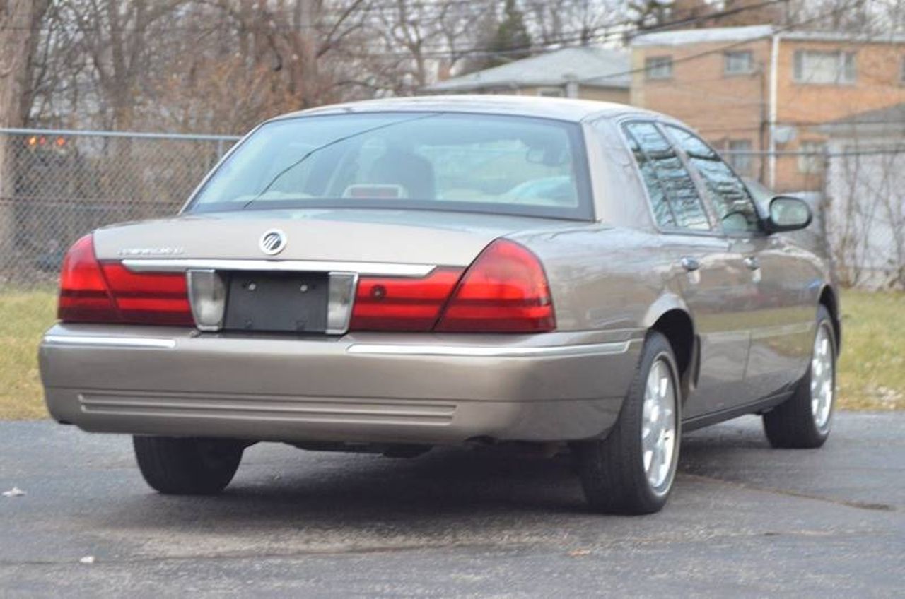 1999 Mercury Grand Marquis | Sioux Falls, SD, Silver Frost Clearcoat Metallic (Silver), Rear Wheel