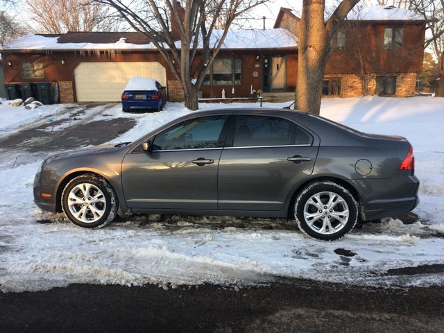 2012 Ford Fusion SE, Sterling Gray Metallic (Gray), Front Wheel