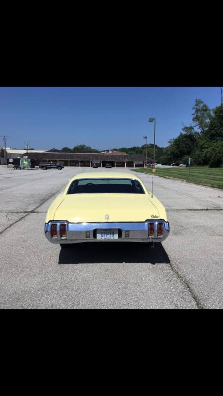 1970 Oldsmobile Cutlass Supreme Holiday coupe | Crooks, SD, Yellow, Rear Wheel