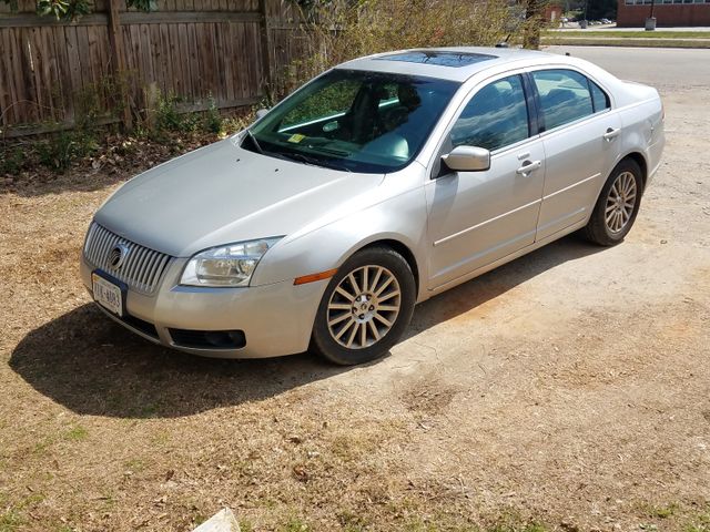 2009 Mercury Milan V6 Premier, Brilliant Silver Clearcoat Metallic (Gray), Front Wheel