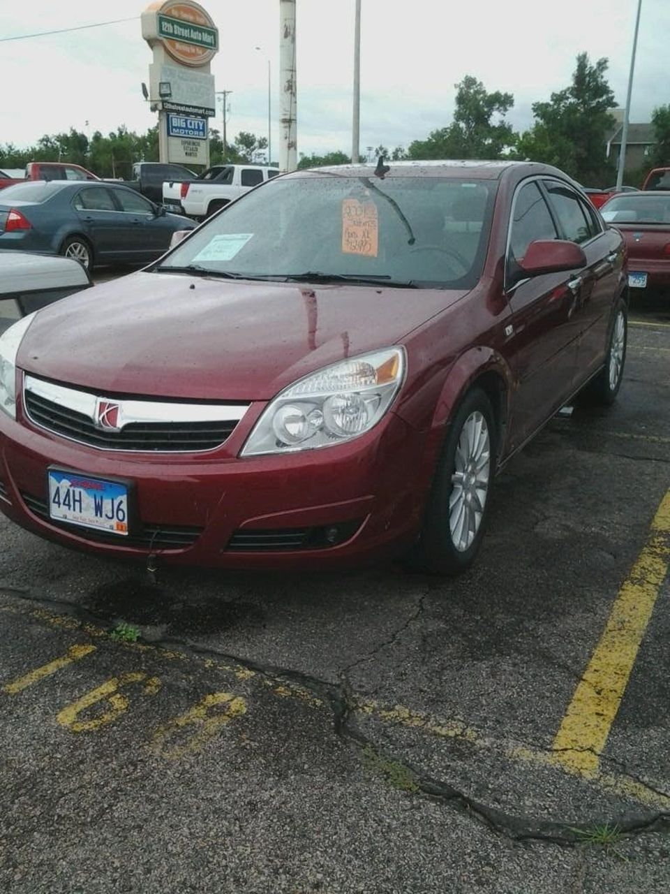 2009 Saturn Aura XR V6 | Sioux Falls, SD, Red Jewel Tintcoat (Red & Orange), Front Wheel