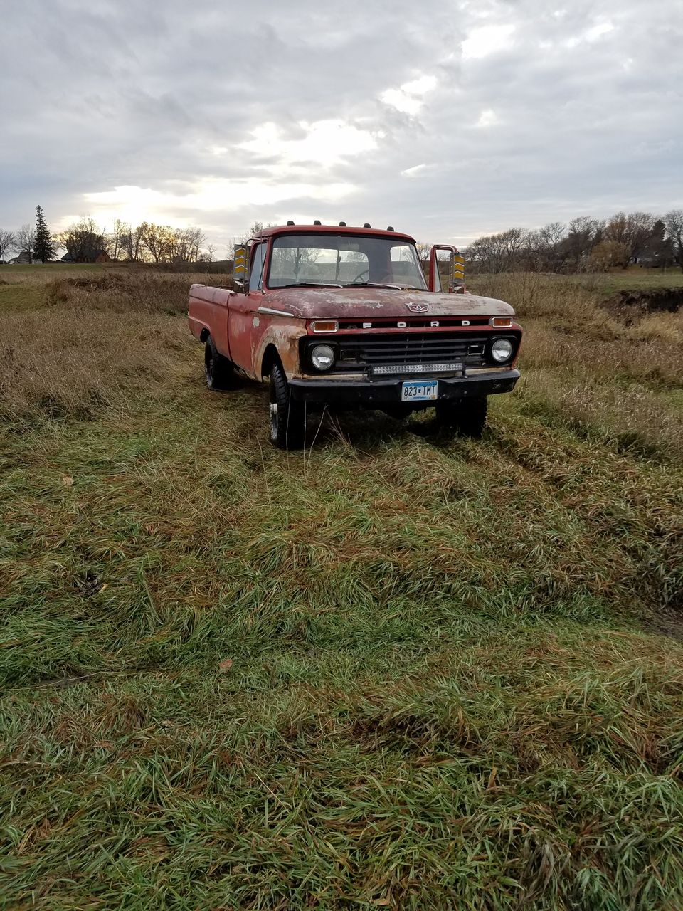 1965 Ford F-250 | Jasper, MN, Red & Orange, 4 Wheel