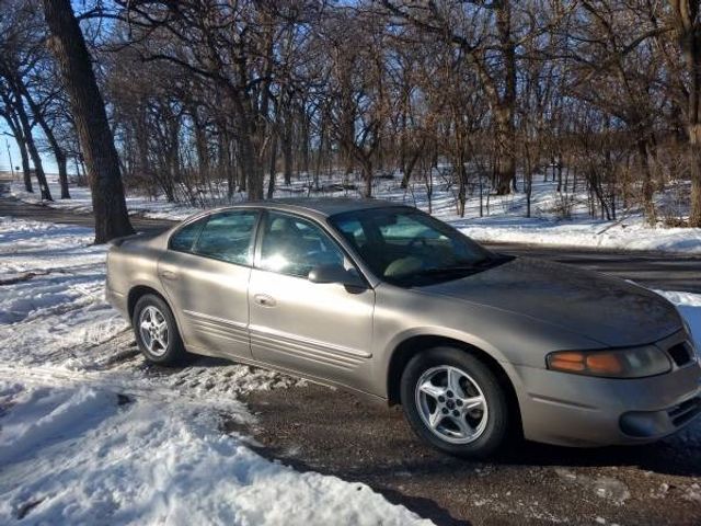 2002 Pontiac Bonneville SE, Light Bronzemist Metallic (Brown & Beige), Front Wheel