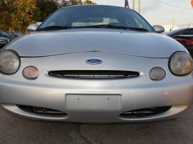 1996 Ford Taurus GL, Silver Frost Clearcoat Metallic (Silver), Front Wheel