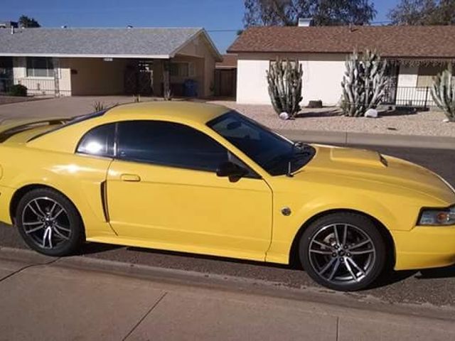2004 Ford Mustang GT Deluxe, Screaming Yellow Clearcoat (Yellow), Rear Wheel