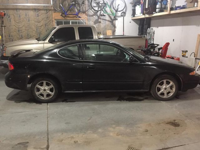 2002 Oldsmobile Alero, Onyx Black (Black), Front Wheel