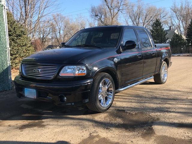 2002 Ford F-150 Harley-Davidson, Black Clearcoat (Black), Rear Wheel