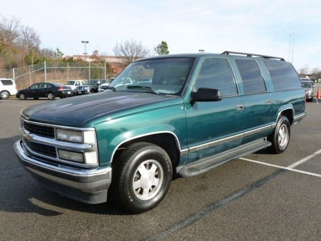 1992 Chevrolet Suburban C1500 | Sioux Falls, SD, Medium Dark Teal Metallic (Green), Rear Wheel