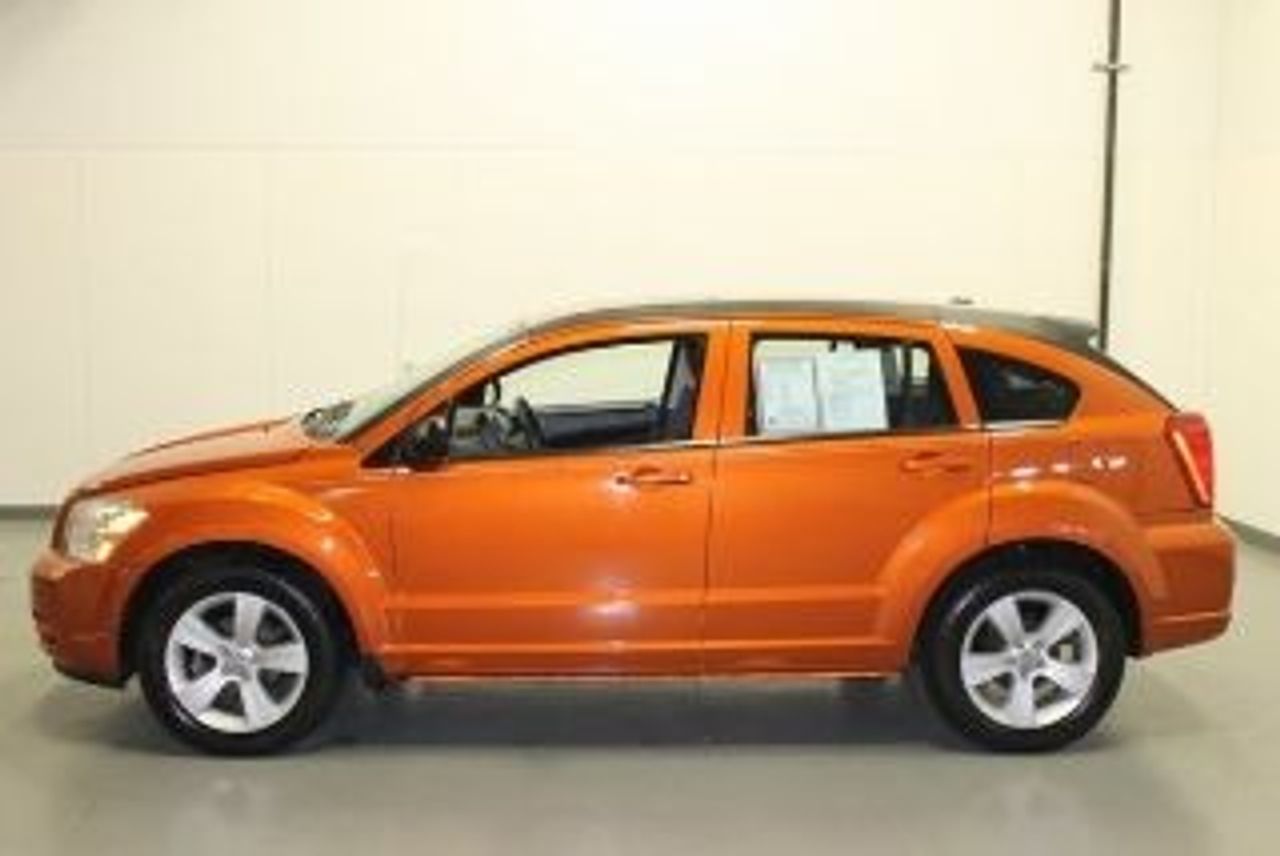 2011 Dodge Caliber | Sioux Falls, SD, Mango Tango Pearl Coat (Red & Orange), Front Wheel