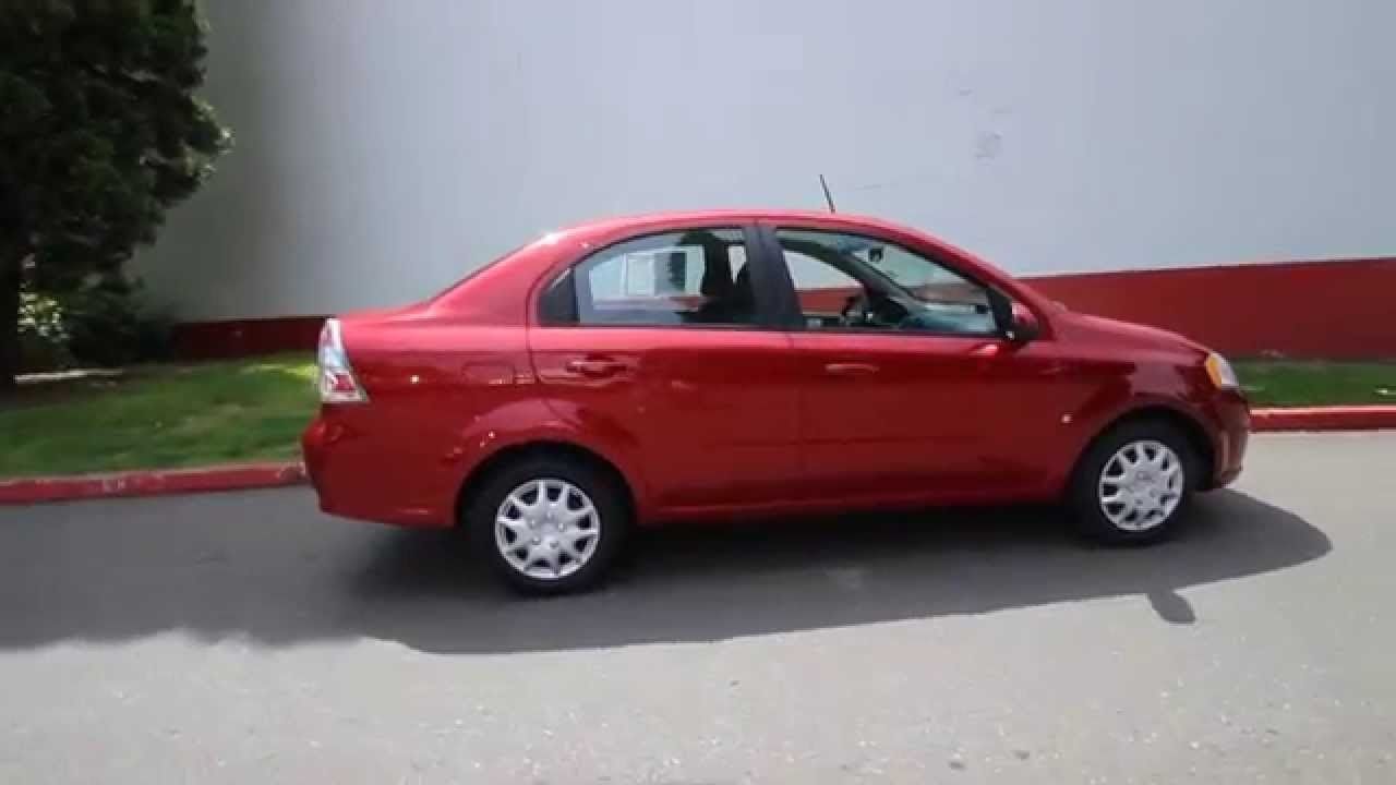 2006 Chevrolet Aveo LS | Vermillion, SD, Sport Red (Red & Orange), Front Wheel