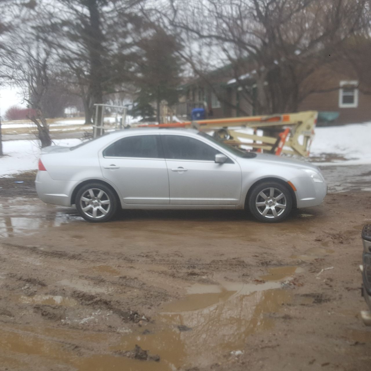 2010 Mercury Milan V6 Premier | Sioux Falls, SD, Sterling Gray Clearcoat Metallic (Gray), Front Wheel