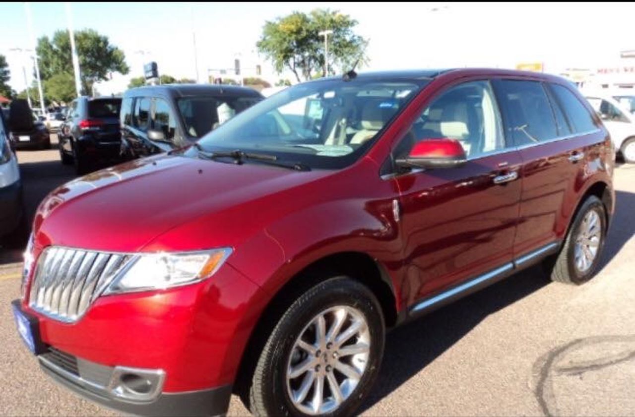 2013 Lincoln MKX Base | Hurley, SD, Ruby Red Metallic Tinted Clearcoat (Red & Orange), Front Wheel