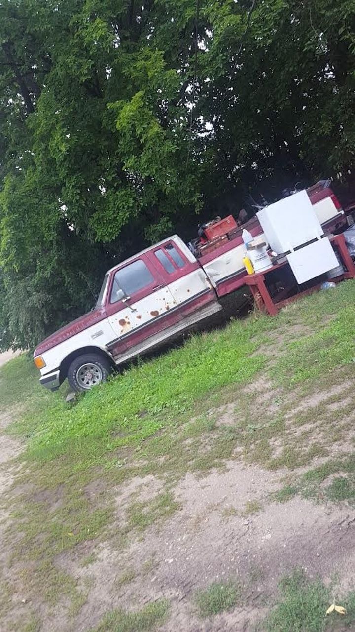 1987 Ford E-350 Base | Mitchell, SD, Off White, Rear Wheel