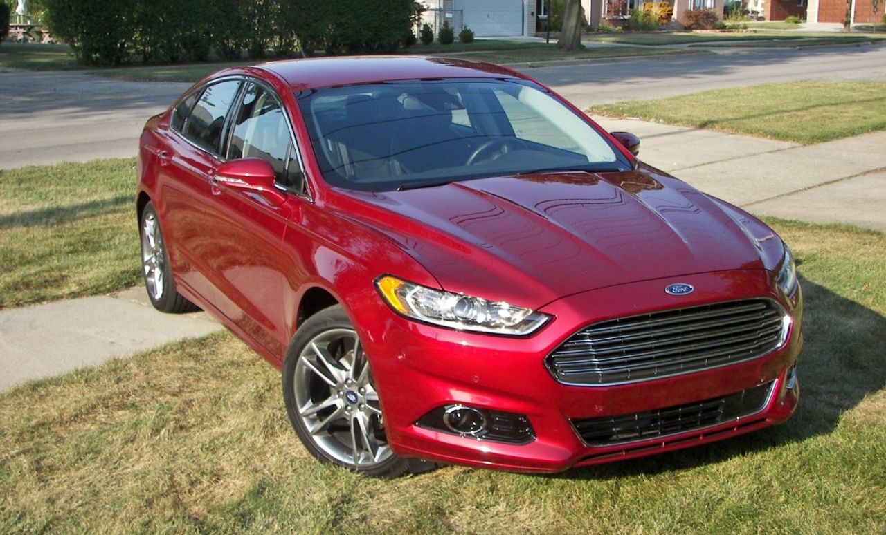 2015 Ford Fusion S | Brandon, SD, Ruby Red Metallic Tinted Clearcoat (Red & Orange), Front Wheel