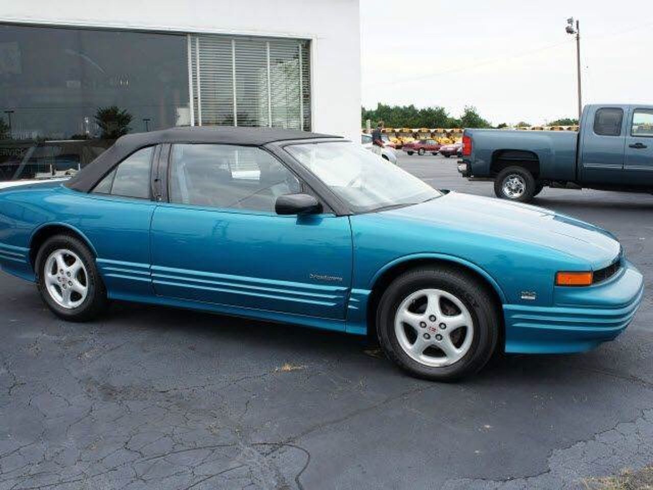 1994 Oldsmobile Cutlass Supreme Base | Madison, SD, Medium Cloisonne Metallic (Blue), Front Wheel