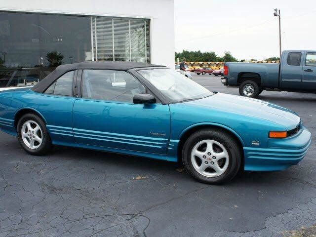 1994 Oldsmobile Cutlass Supreme Base, Medium Cloisonne Metallic (Blue), Front Wheel