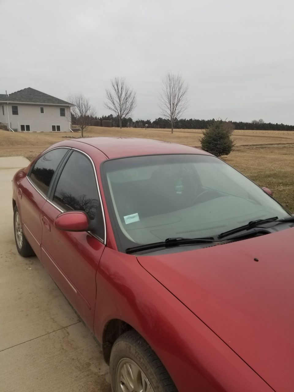2002 Mercury Sable | Sioux Falls, SD, Matador Red Clearcoat Metallic (Red & Orange), Front Wheel