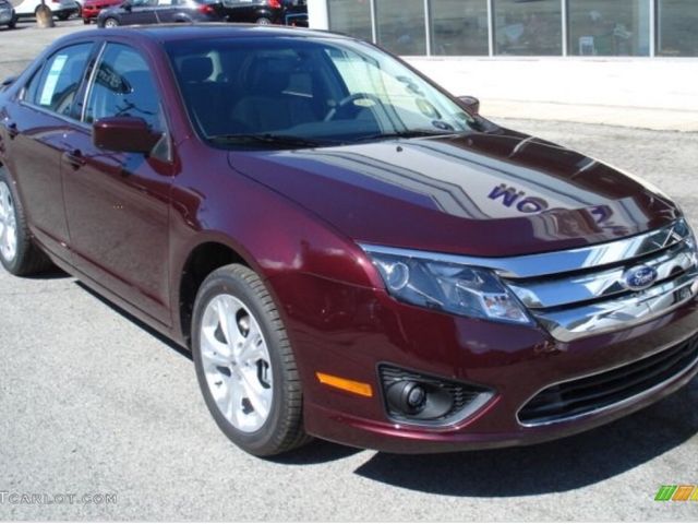 2012 Ford Fusion SEL, Bordeaux Reserve Metallic Red (Red & Orange), Front Wheel