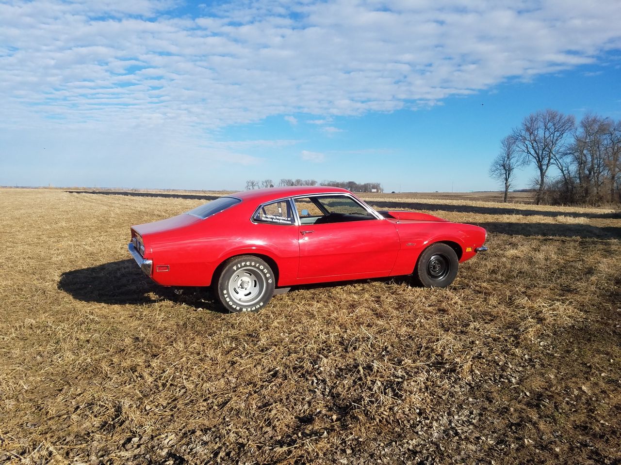 1971 Ford Maverick | Hurley, SD, Red & Orange, Rear Wheel