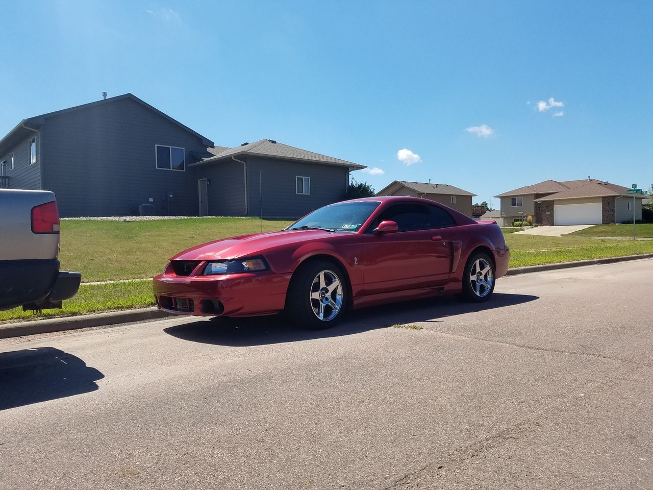 2004 Ford Mustang SVT Cobra SVT | Sioux Falls, SD, Redfire Clearcoat Metallic (Red & Orange), Rear Wheel