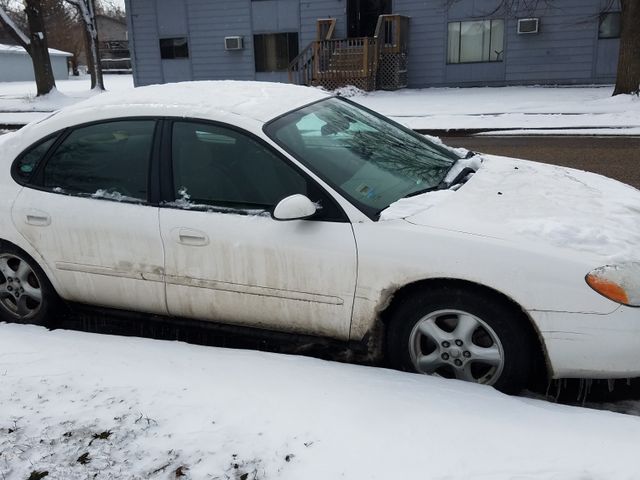 2003 Ford Taurus SE, Vibrant White Clearcoat (White), Front Wheel