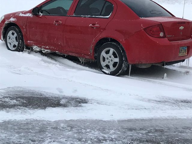 2006 Chevrolet Cobalt, Victory Red (Red & Orange), Front Wheel