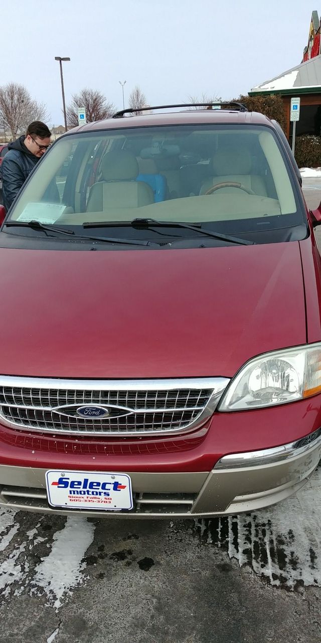 2003 Ford Windstar | Sioux Falls, SD, Matador Red Clearcoat Metallic (Red & Orange), Front Wheel