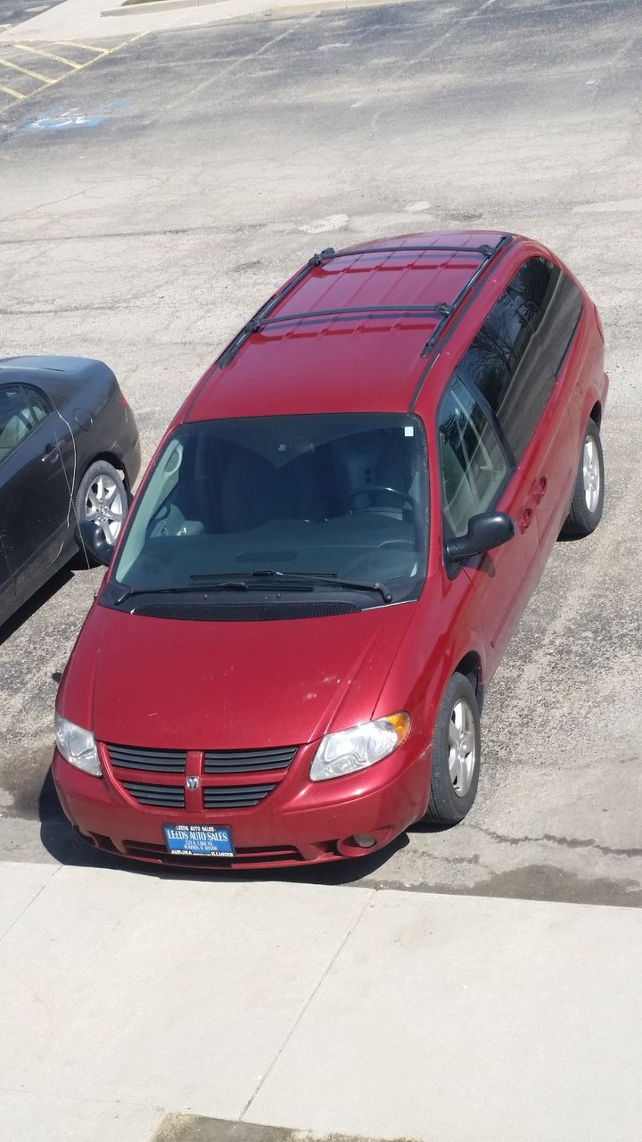 2006 Dodge Caravan SXT | Oswego, IL, Inferno Red Crystal Pearlcoat (Red & Orange), Front Wheel