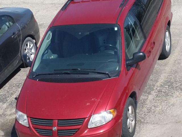 2006 Dodge Caravan SXT, Inferno Red Crystal Pearlcoat (Red & Orange), Front Wheel