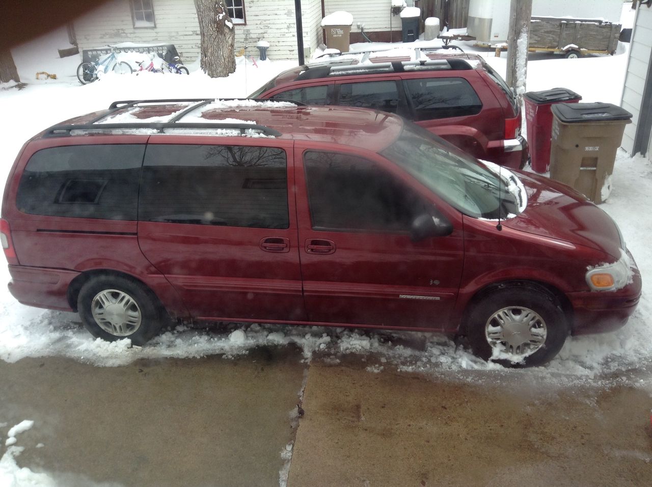 2002 Chevrolet Venture Warner Brothers | Harrisburg, SD, Medium Redfire Metallic (Red & Orange), Front Wheel