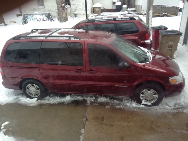 2002 Chevrolet Venture Warner Brothers, Medium Redfire Metallic (Red & Orange), Front Wheel