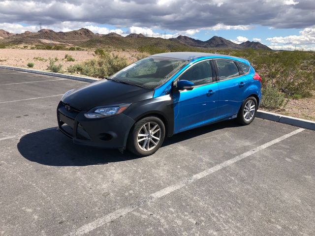 2015 Ford Focus SE, Blue Candy Metallic Tinted Clearcoat (Blue), Front Wheel