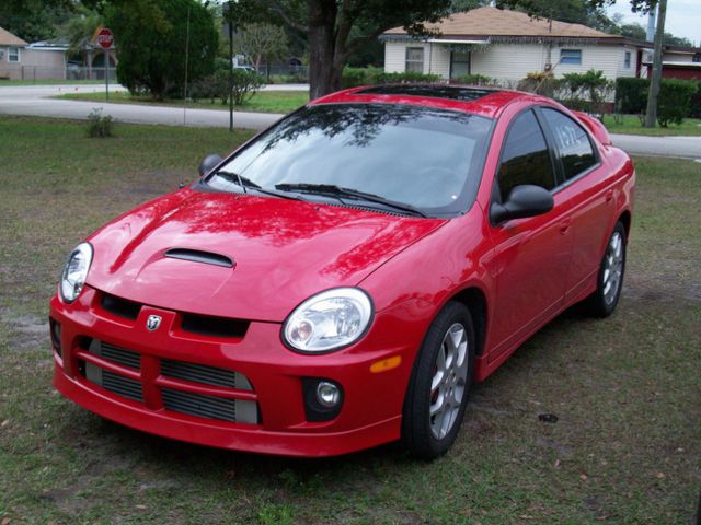 2005 Dodge Neon SXT, Inferno Red Crystal Pearlcoat (Red & Orange), Front Wheel