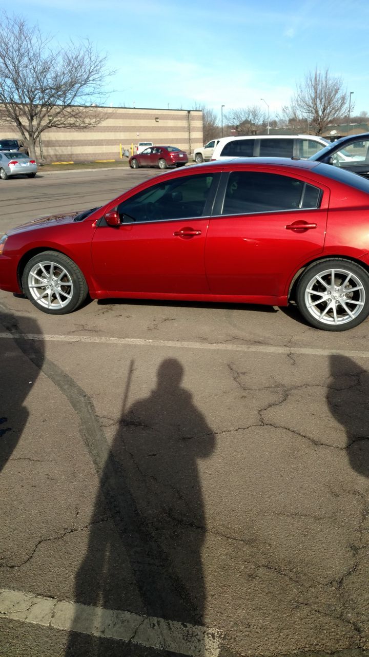 2012 Mitsubishi Galant | Sioux Falls, SD, Rave Red Pearl (Red & Orange), Front Wheel