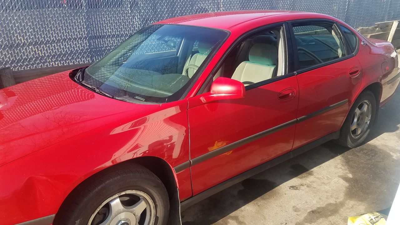 2004 Chevrolet Impala Base | Sioux Falls, SD, Victory Red (Red & Orange), Front Wheel