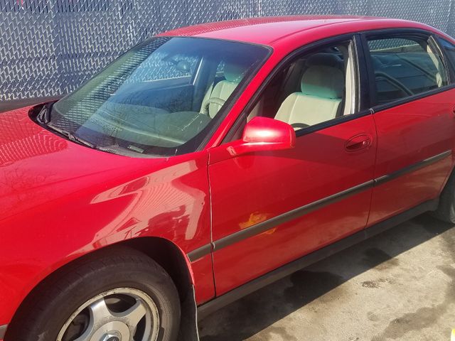2004 Chevrolet Impala Base, Victory Red (Red & Orange), Front Wheel