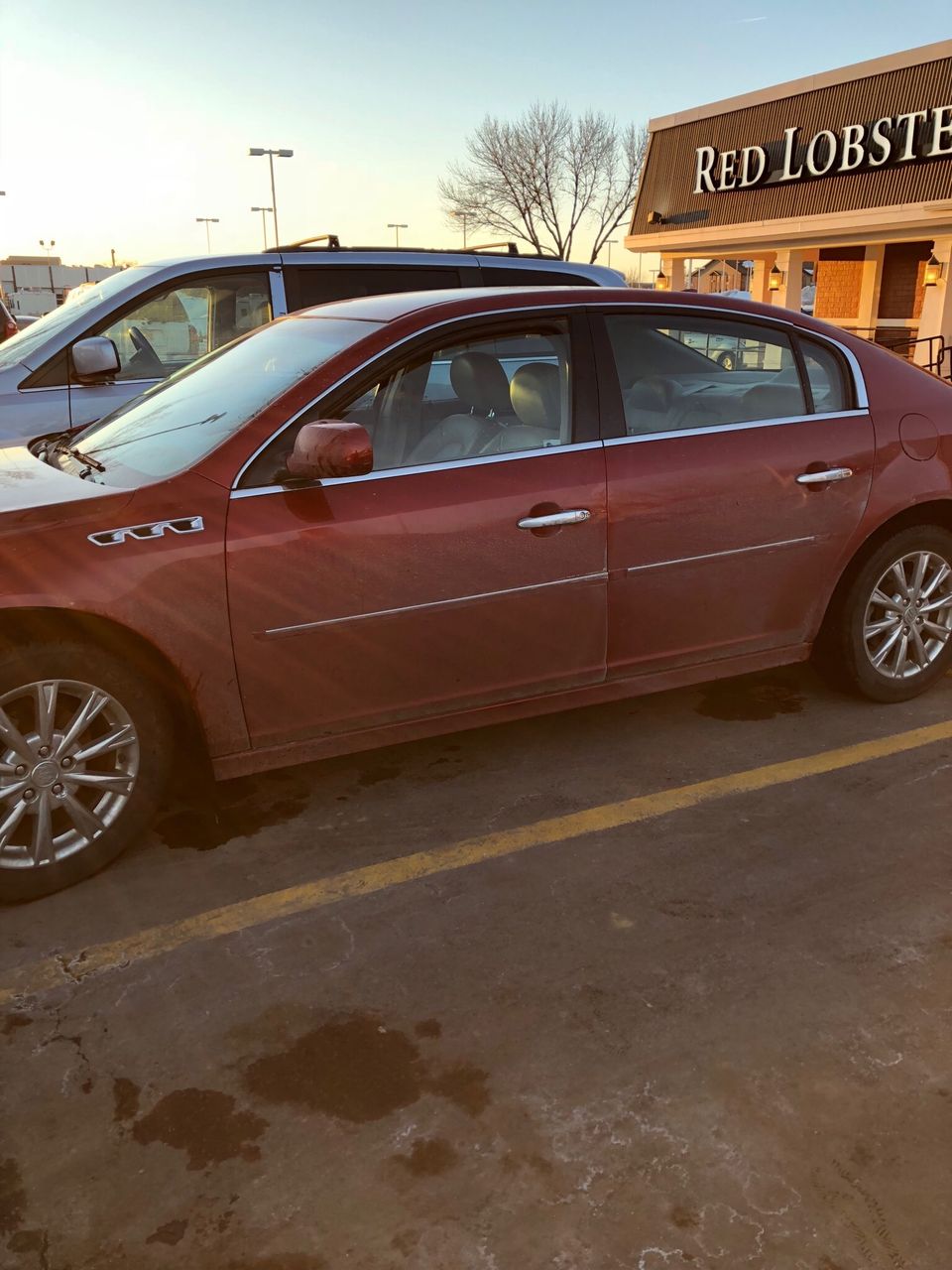 2011 Buick Lucerne | Hartford, SD, Crystal Red Tintcoat (Red & Orange), Front Wheel